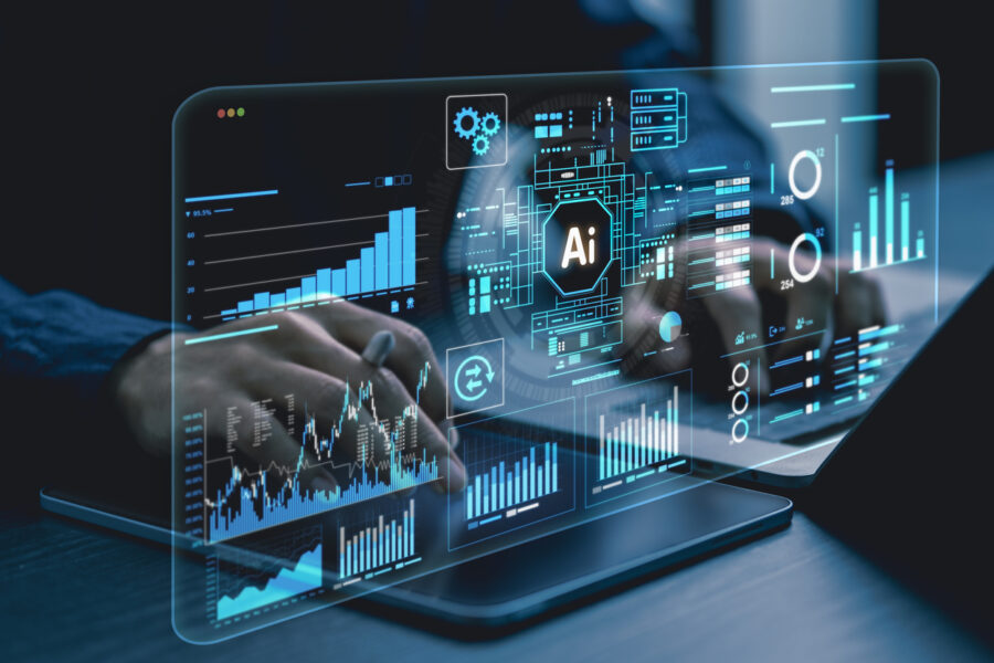 Business professional using laptop with AI analytics dashboard and data visualization interface.